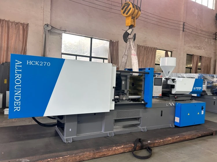 Injection molding machine tonnage